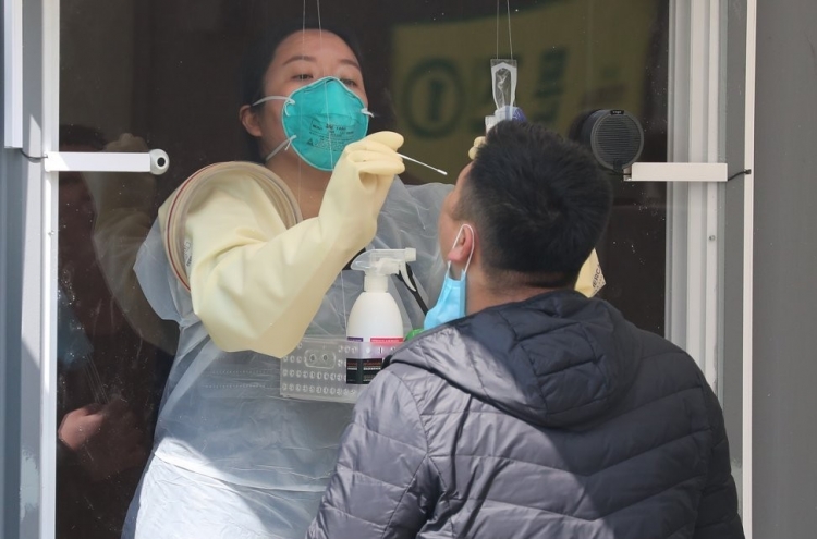 Walkthrough virus screening center for intl. arrivals opens at Seoul sports complex