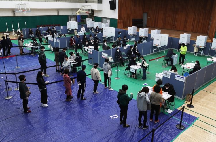 S. Korean voters cast ballots in world's first national coronavirus election