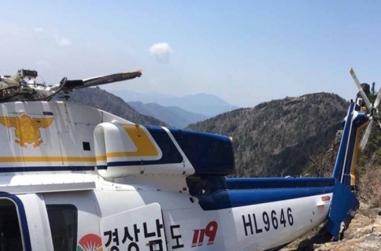 Firefighting helicopter with 7 aboard crashes