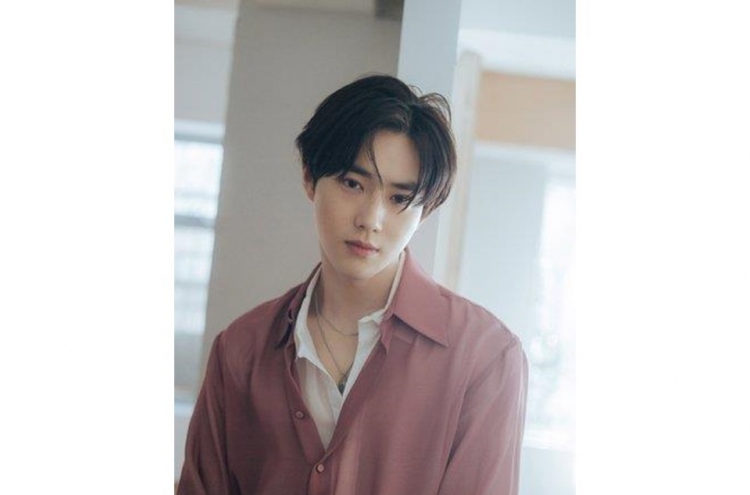 EXO's Suho temporarily leaves band to serve military term