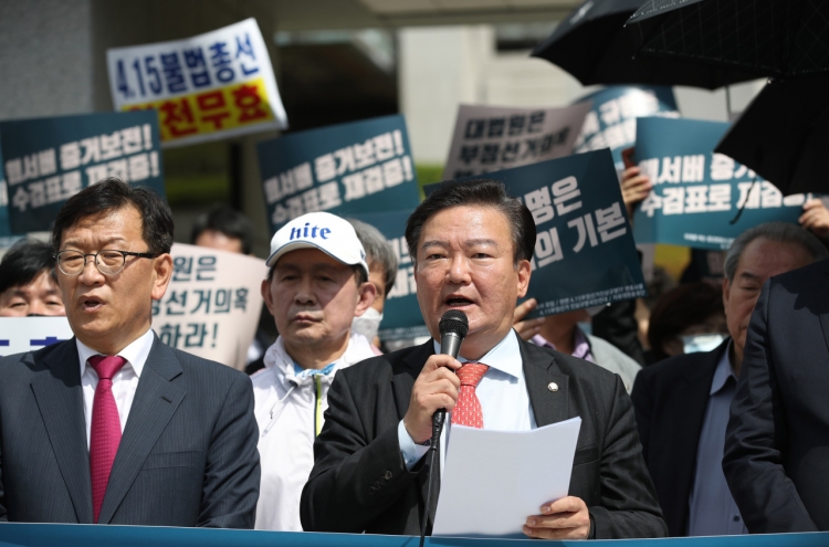 Defeated opposition lawmaker asks top court to nullify election results