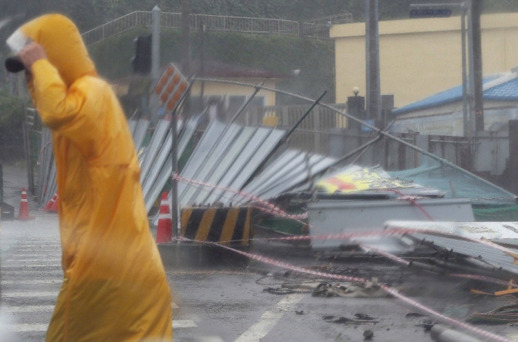 Flights and ferries canceled as Typhoon Bavi arrives