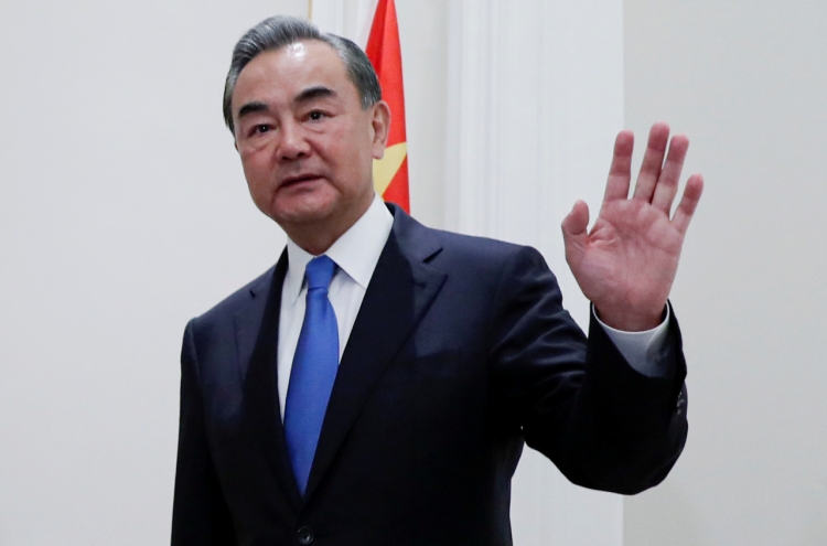 Beijing says US officials have 'lost their minds' over China