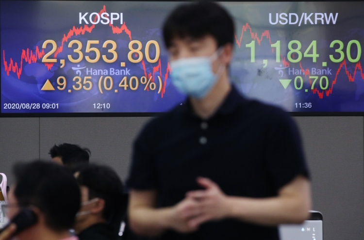 Seoul stocks finish higher on US Fed's dovish signal