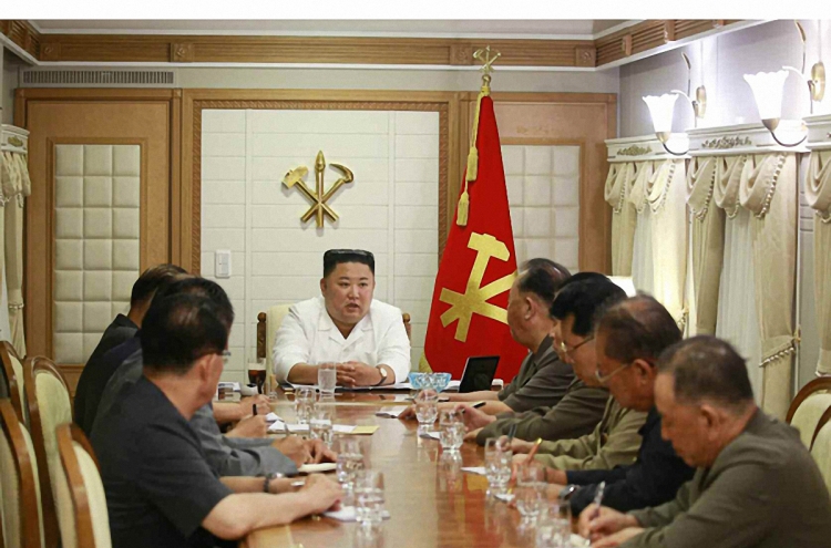NK leader holds party meeting during visit to typhoon-hit area