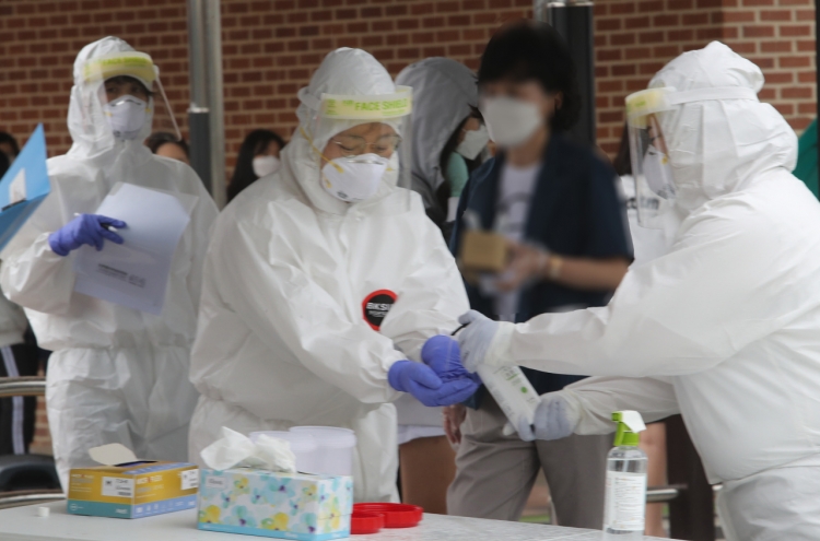 New virus cases under 200 for 12th day; eased virus curbs applied in greater Seoul