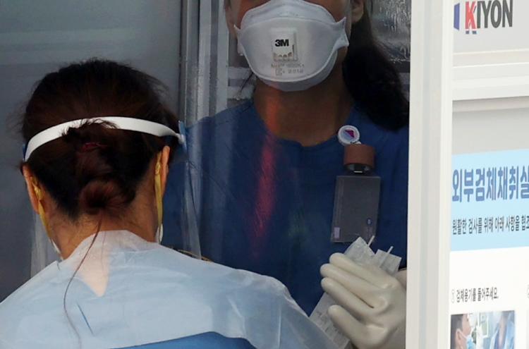 Coronavirus infections break out at Seoul face mask company