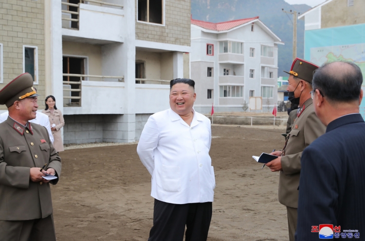 NK leader inspects flood recovery efforts together with sister
