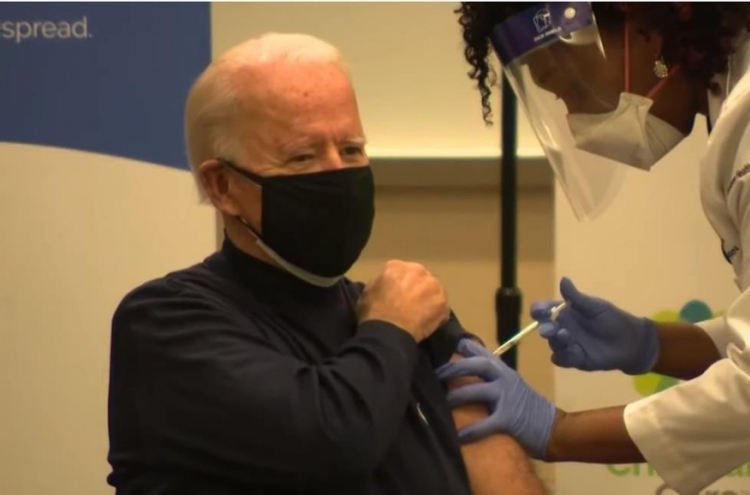 Biden gets vaccinated for COVID-19, tells people to follow suit