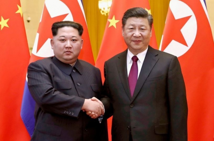 China's Xi tells N. Korea's Kim that he upholds political settlement of Korean Peninsula issue