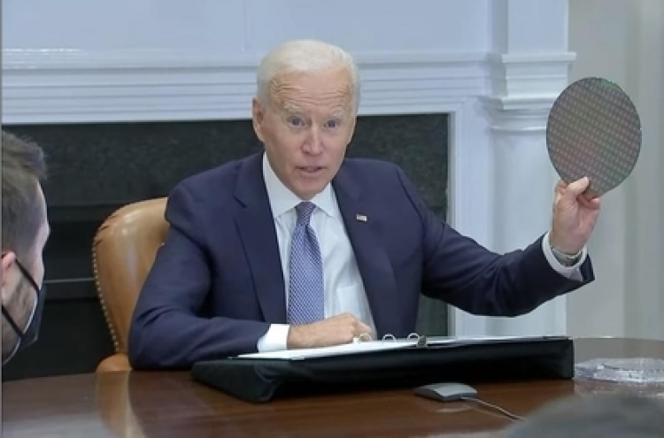 Biden pledges more investment in meeting over semiconductor shortage
