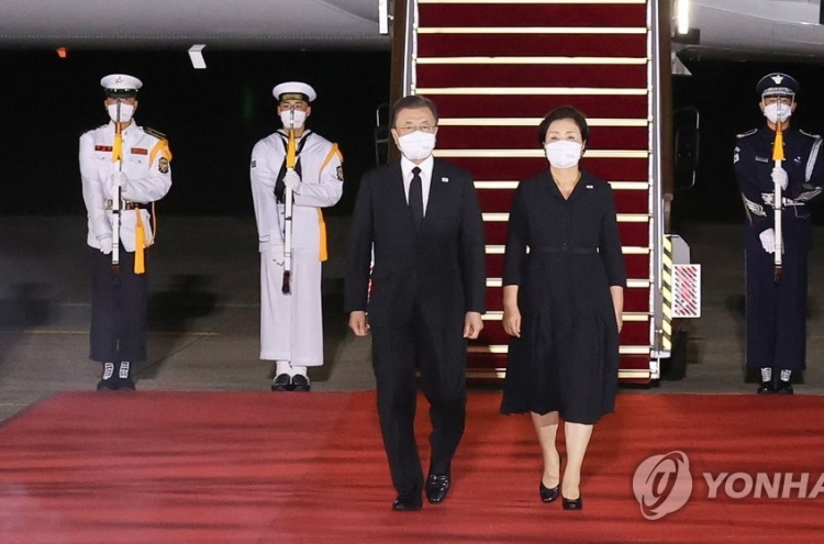 Moon back in Seoul with war remains from US