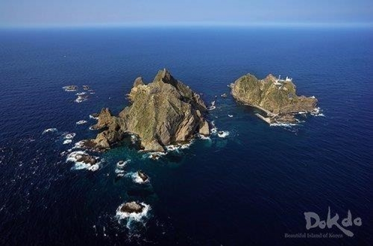 Ship carrying 9 capsizes in waters northeast of Dokdo