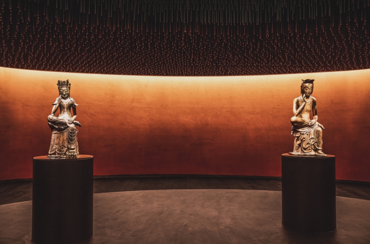 Sitting side-by-side, two Pensive Bodhisattvas offer calm
