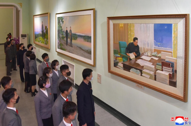 N. Korea urges 'absolute trust' in its leader, marking his father's death anniversary