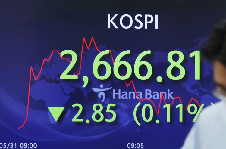 Seoul shares open tad lower amid continued recession woes