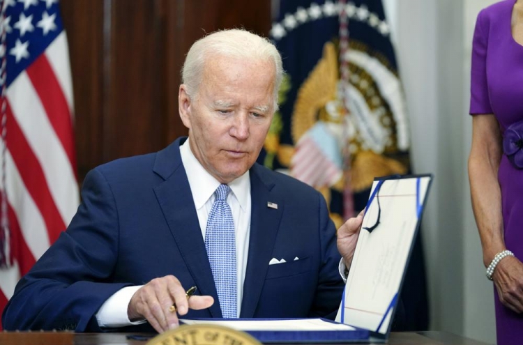 [Newsmaker] Biden signs landmark gun measure, says 'lives will be saved'
