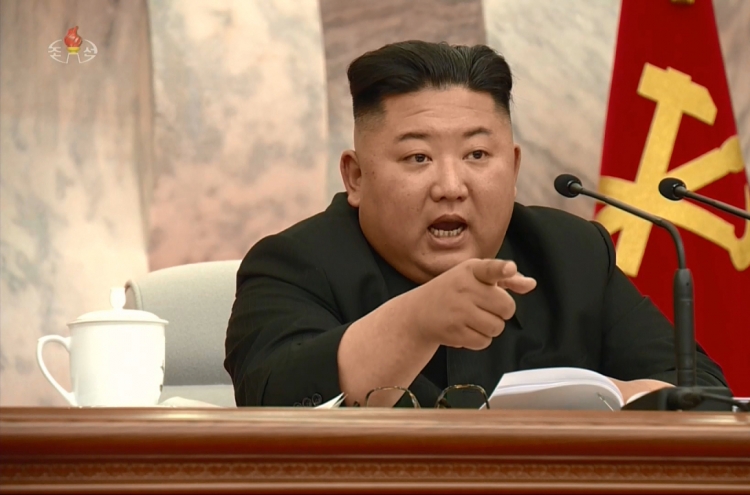 N. Korean leader discusses reorganization of departments in party meeting: state media
