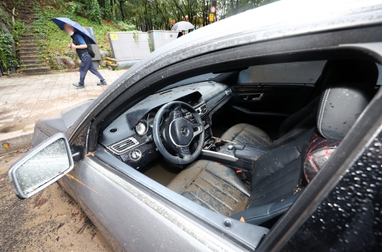 More than 1,000 vehicles damaged by heavy rains