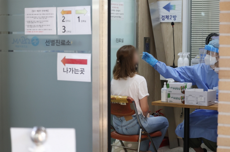 S. Korea's new COVID-19 cases drop below 100,000