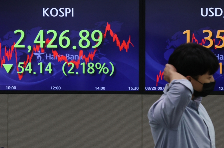 Seoul shares open lower on US rate hike woes