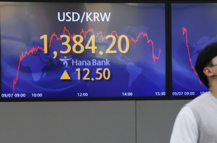Seoul shares tumble, local currency at over 13-yr low amid recession woes