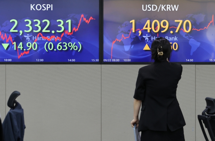Seoul's stocks down, currency dips to over 13-yr low following Fed's rate hike