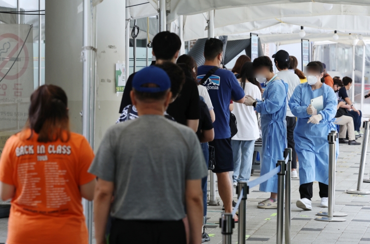S. Korea's new COVID-19 cases fall to nearly 10,000 amid virus slowdown