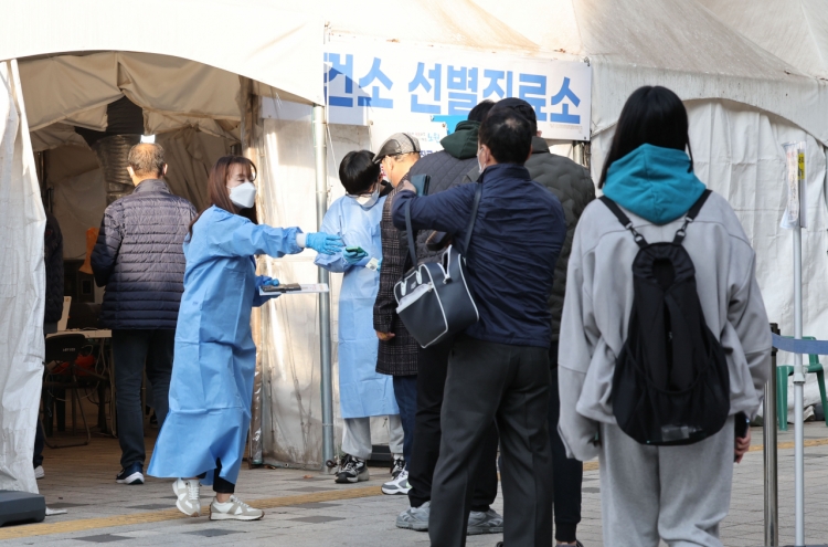 S. Korea's new COVID-19 cases below 50,000; worries remain high on resurgence