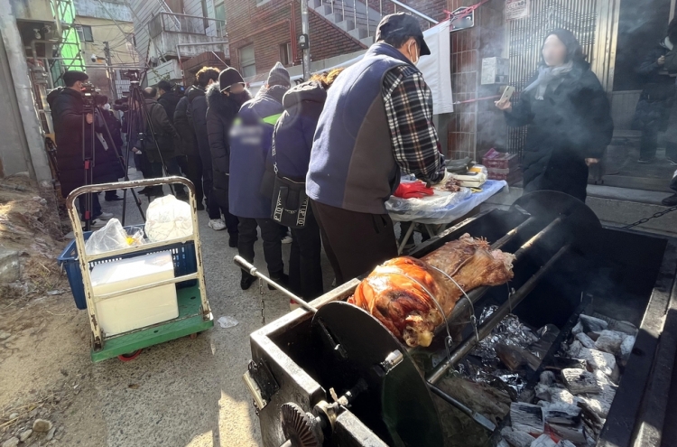 Residents of Daegu protest mosque construction with pork barbecue