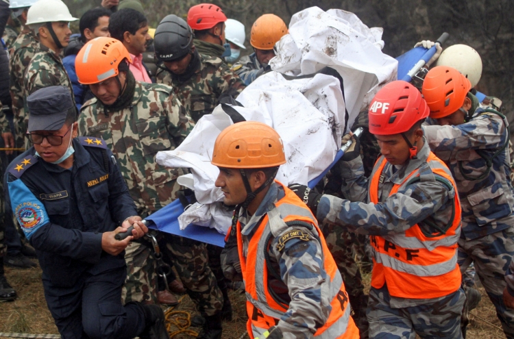 Search continues for Korean still missing after plane crash in Nepal