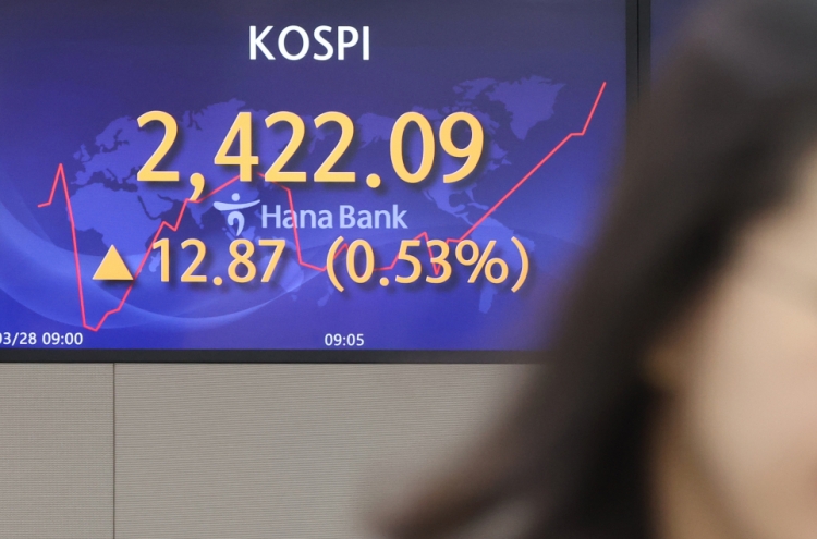 Seoul shares open higher on easing banking crisis