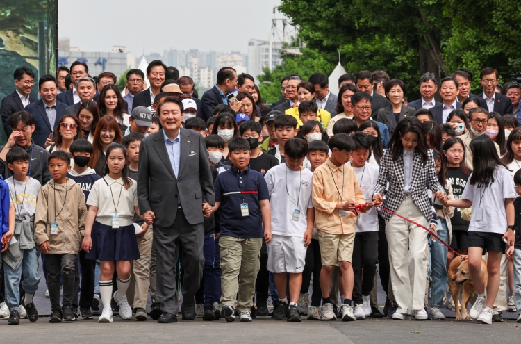 Yoon celebrates opening of children's garden on ex-US military base