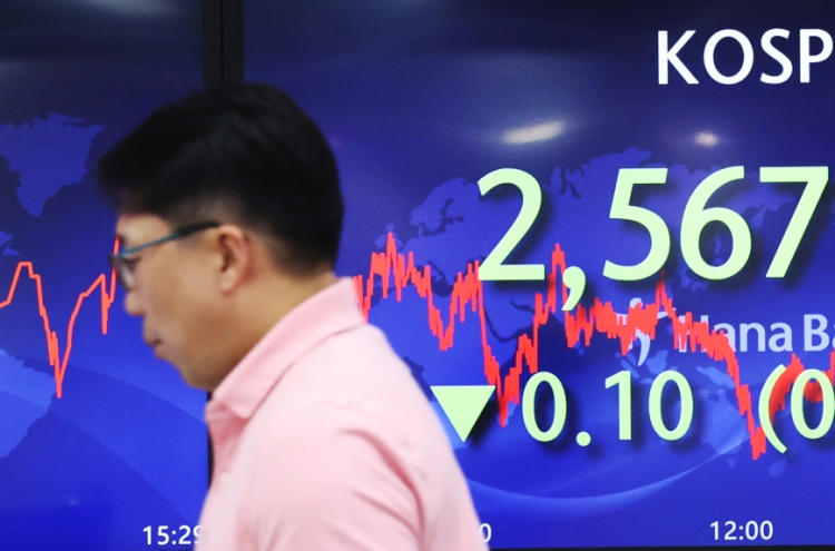 Seoul shares open slightly higher on chip shares