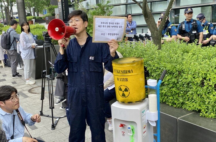 Environmental group protests Fukushima wastewater discharge plan