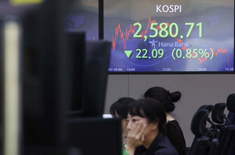 Seoul shares open higher on US gains amid rate hike woes