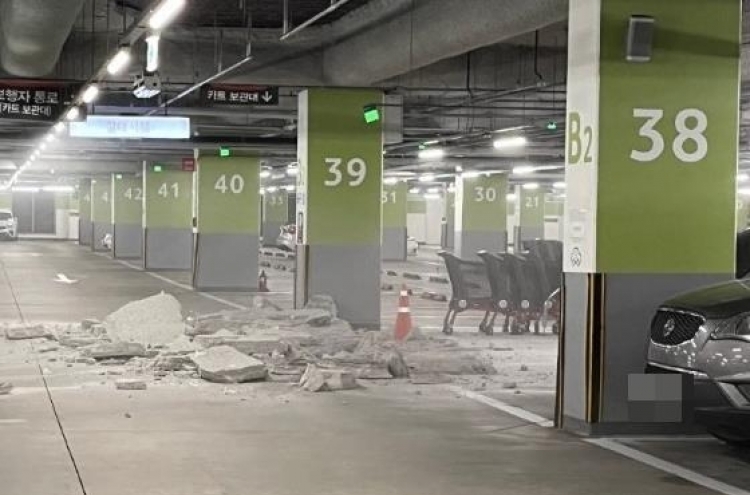Supermarket parking lot roof partially collapses in Songdo