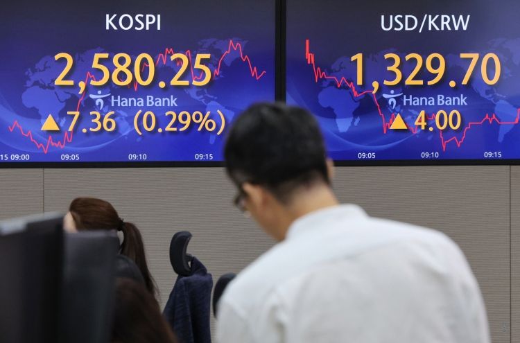 Seoul shares open higher amid hope for Fed's rate hike pause