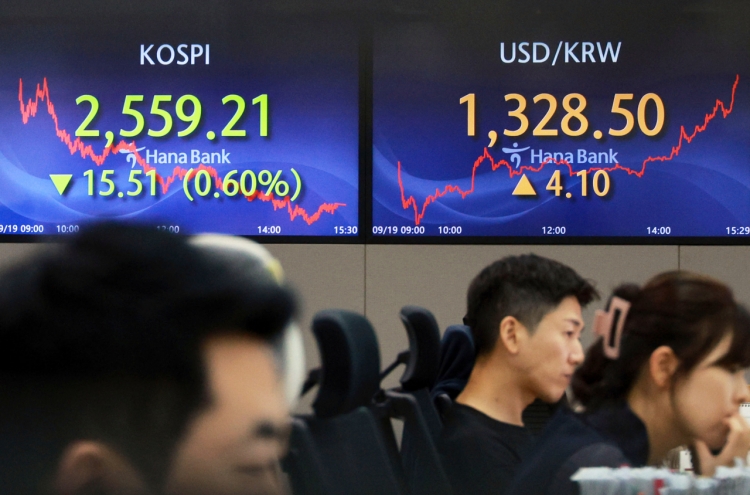 Seoul shares open lower after Fed's rate decision