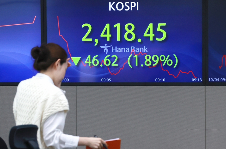 Seoul shares open higher on Fed rate pause hopes