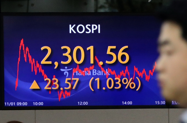 Seoul shares open higher on Fed's rate freeze