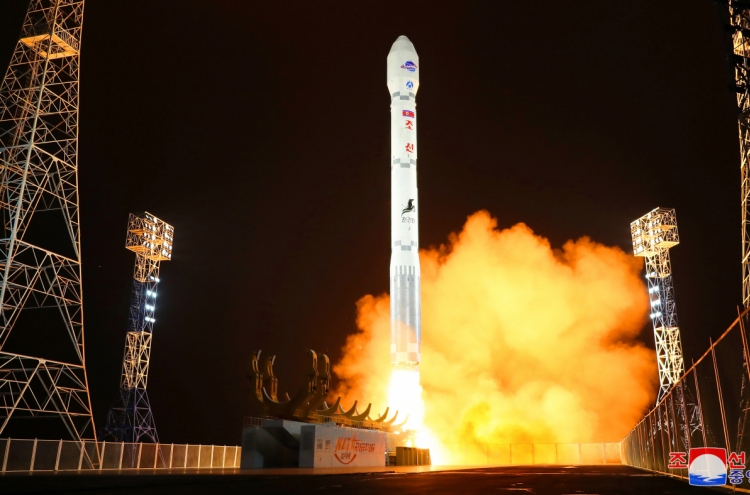 N. Korea says it successfully placed spy satellite into orbit, will launch more