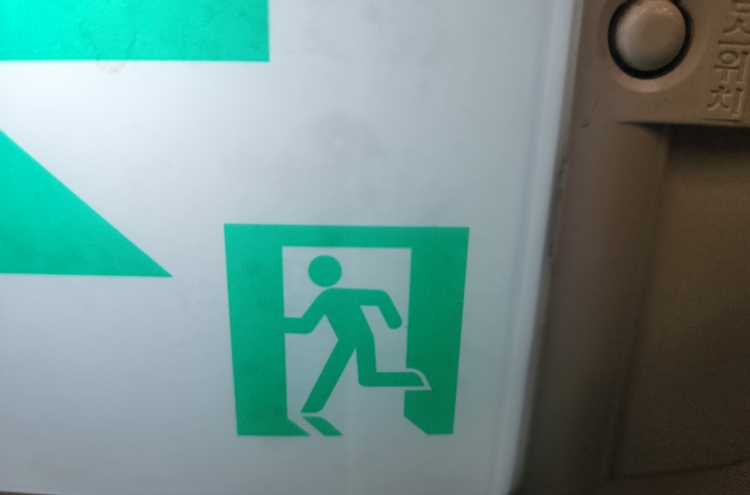 Netizens abuzz over false rumors of 'politically correct' skirt-wearing fire exit signs