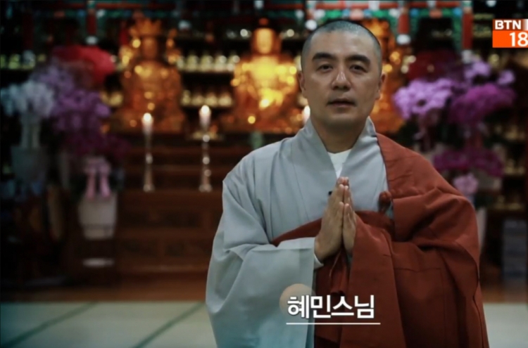 Celebrity monk returns to TV after uproar over his wealth, lifestyle
