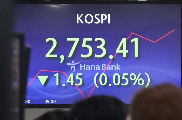 Seoul shares open nearly flat on profit taking