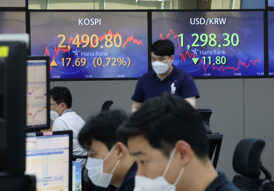 Seoul shares open lower on Fed's minutes