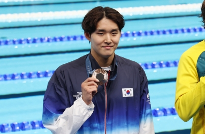 Impressive career progression culminates in 1st Olympic medal for swimmer Kim Woo-min