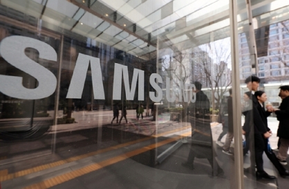 Samsung tightens its belt amid crisis winds