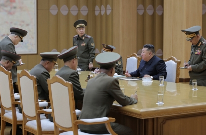 Kim Jong-un charts military action over alleged drone incursion