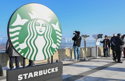 [From the Scene] At this Starbucks, you need ID: Franchise opens store with view of North Korea